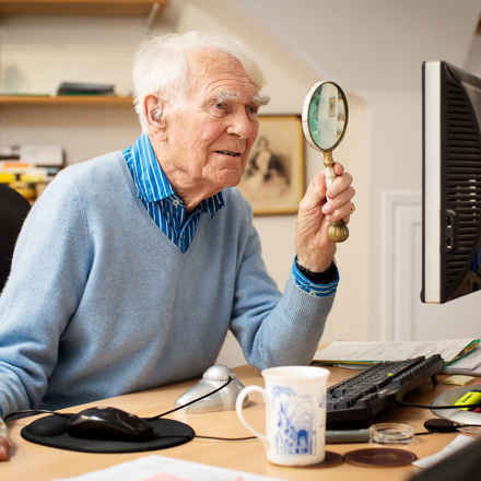 Pat Butler with magnifier