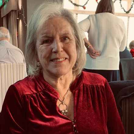 Carol Ozanne smiling into camera