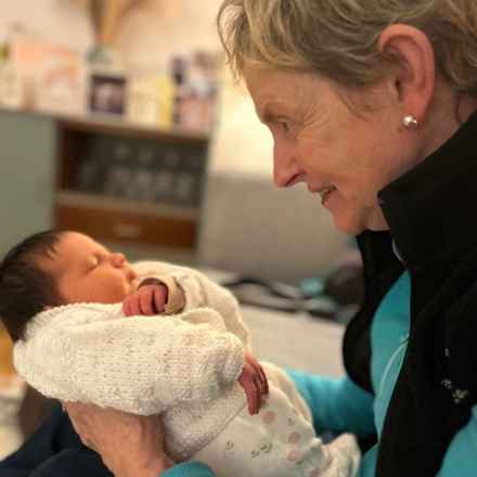 Beverley Chow holding baby