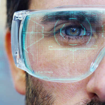 Close up of man wearing technology glasses