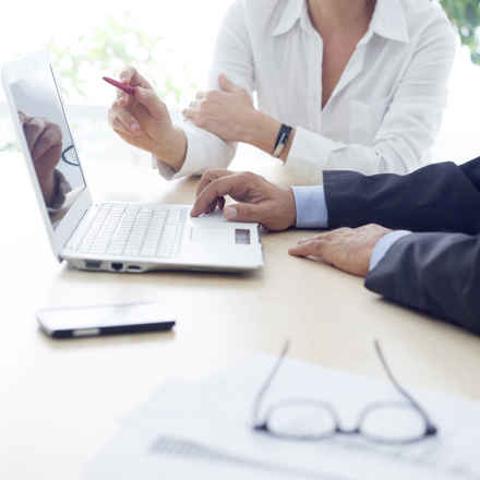 office desk with document and laptop